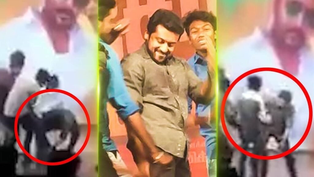Suriya Touches Fans Feet at TSK Movie Event Suriya Touches Fans Feet at TSK Movie Event