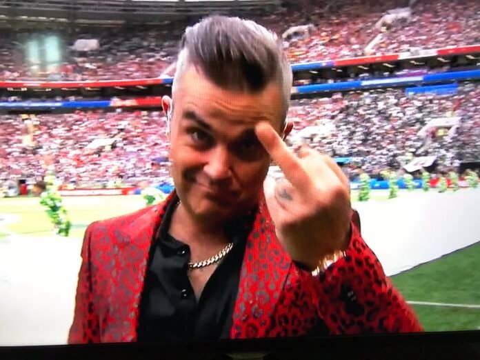 Robbie Williams Shows Middle Finger